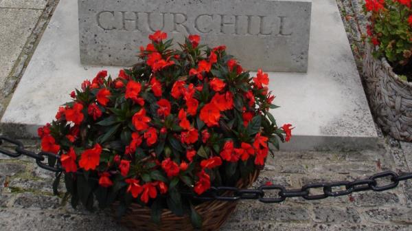 Flowers sit before a Churchill grave